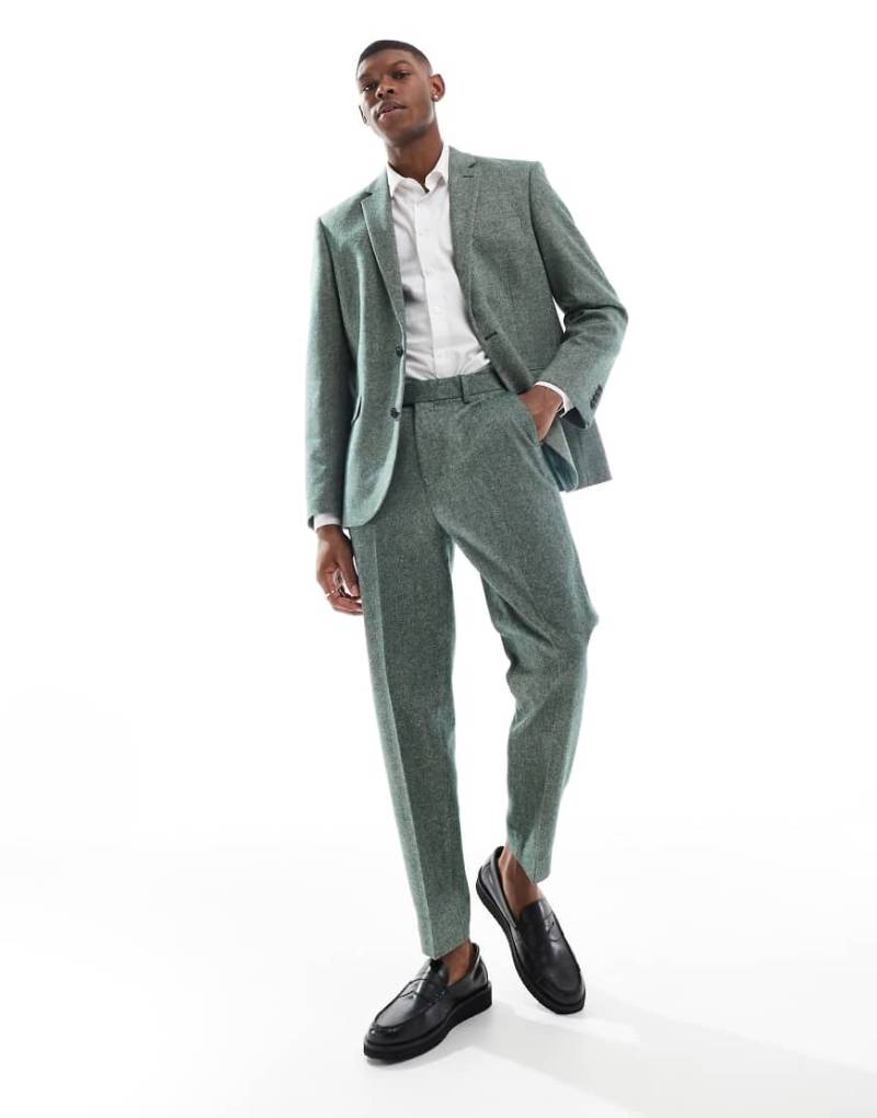ASOS DESIGN - Schmal zulaufende Anzughose aus Wollmix-Tweed in Flaschengrün von ASOS DESIGN