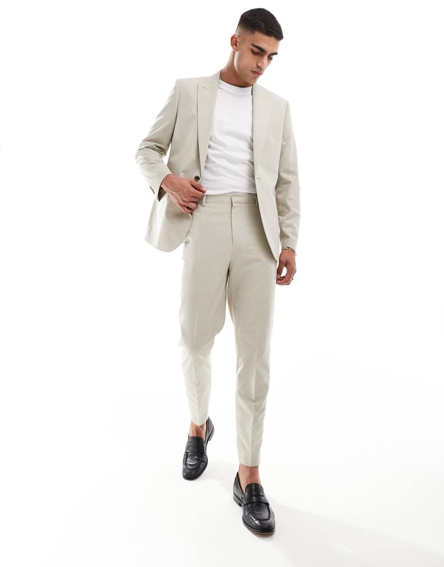 ASOS DESIGN - Schmal zulaufende Anzughose aus strukturiertem Stoff in Stein-Neutral ASOS DESIGN - Schmal zulaufende Anzughose aus strukturiertem Stoff in Stein-Neutral von ASOS DESIGN