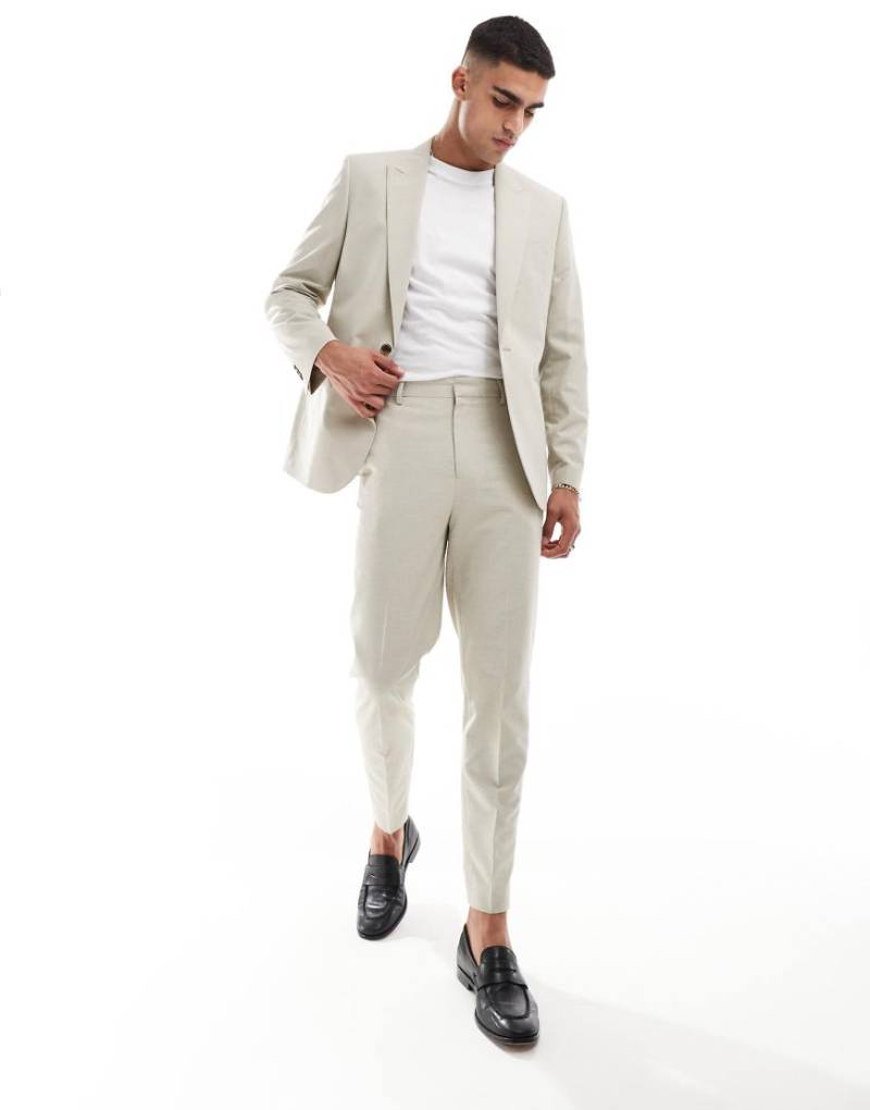 ASOS DESIGN - Schmal zulaufende Anzughose aus strukturiertem Stoff in Stein-Neutral von ASOS DESIGN