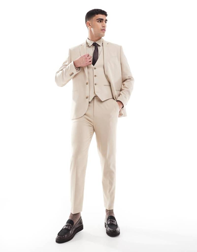 ASOS DESIGN - Schmal zulaufende Anzughose aus strukturiertem Stoff in Steinbeige-Neutral von ASOS DESIGN
