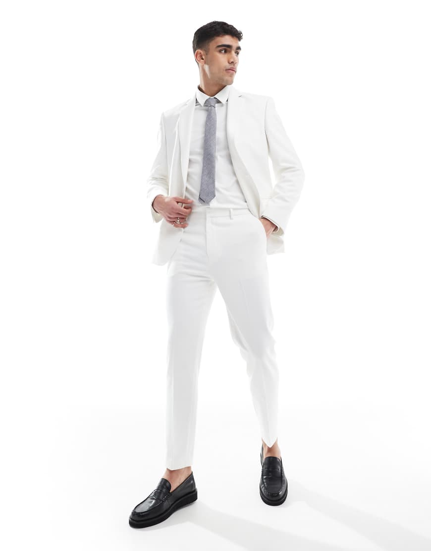 ASOS DESIGN - Schmal zulaufende Anzughose aus strukturiertem Stoff in Weiß ASOS DESIGN - Schmal zulaufende Anzughose aus strukturiertem Stoff in Weiß von ASOS DESIGN