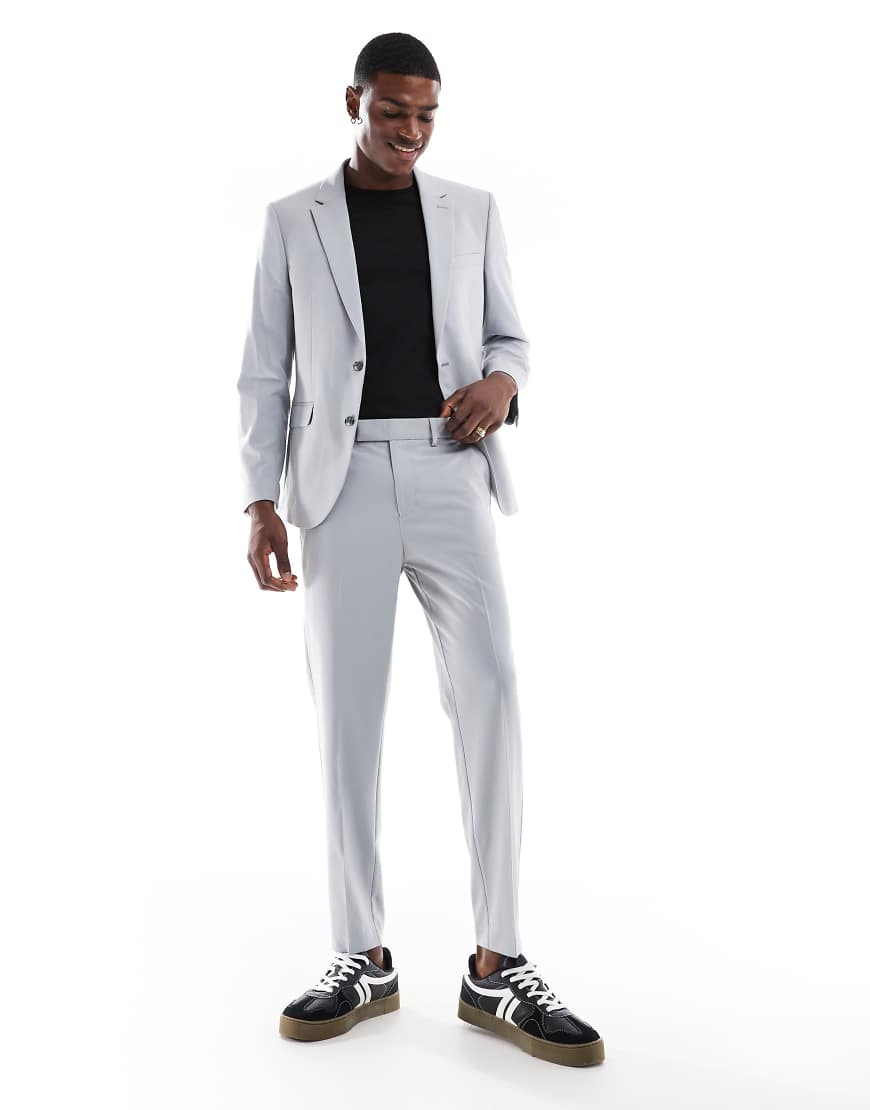 ASOS DESIGN - Schmal zulaufende Anzughose in Grau ASOS DESIGN - Schmal zulaufende Anzughose in Grau von ASOS DESIGN