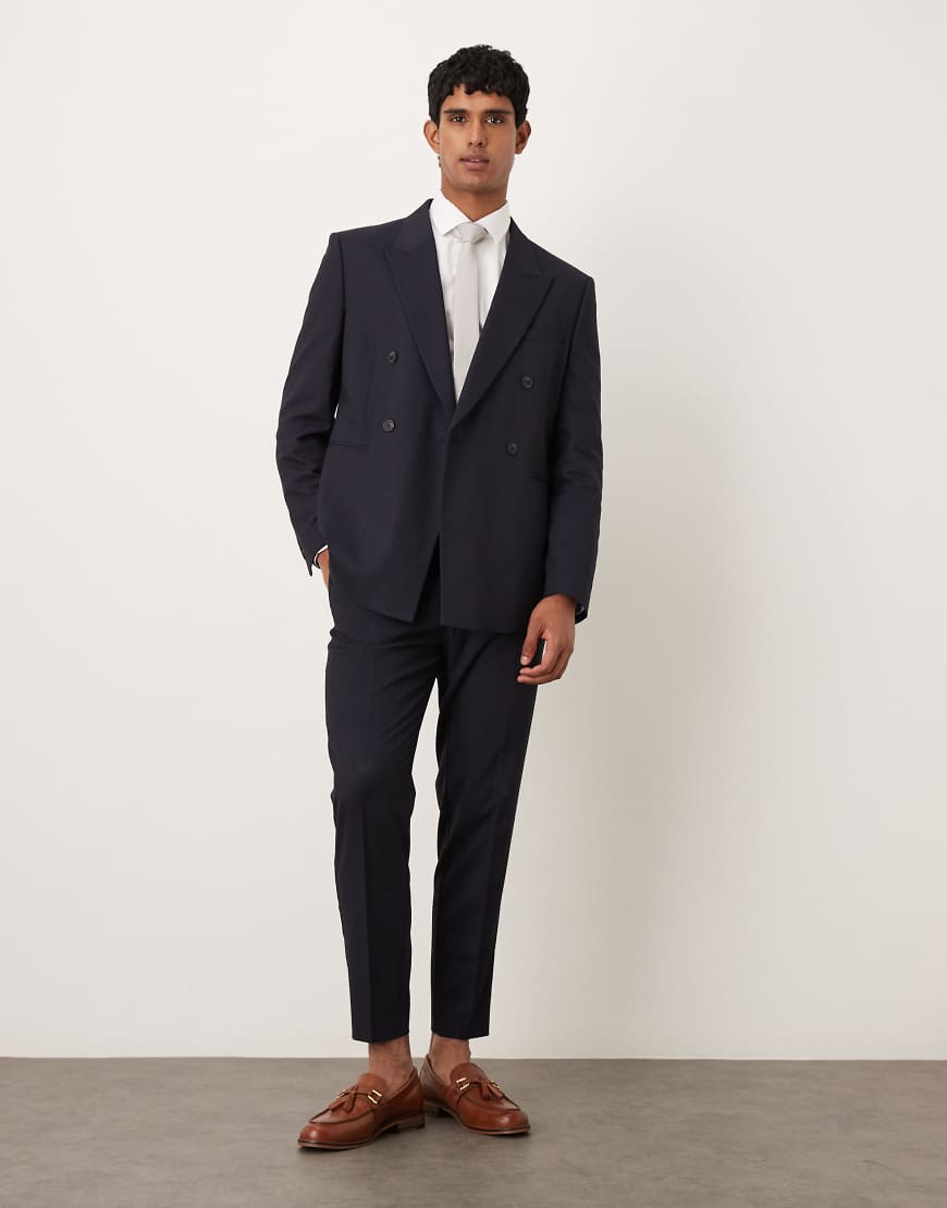 ASOS DESIGN - Schmal zulaufende Anzughose in Marineblau ASOS DESIGN - Schmal zulaufende Anzughose in Marineblau von ASOS DESIGN