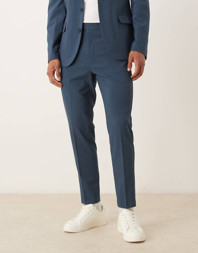 ASOS DESIGN - Schmal zulaufende Anzughose in Marineblau von ASOS DESIGN