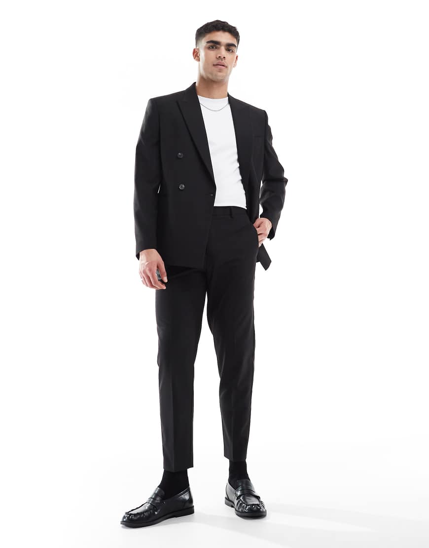 ASOS DESIGN - Schmal zulaufende Anzughose in Schwarz ASOS DESIGN - Schmal zulaufende Anzughose in Schwarz von ASOS DESIGN