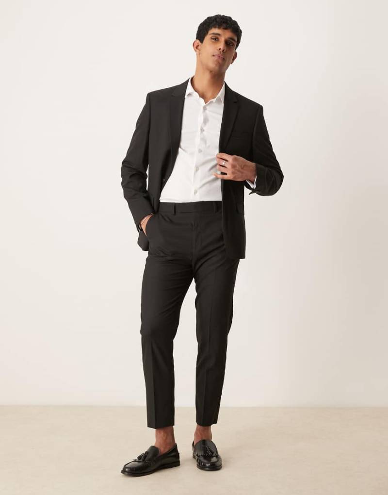 ASOS DESIGN - Schmal zulaufende Anzughose in Schwarz von ASOS DESIGN