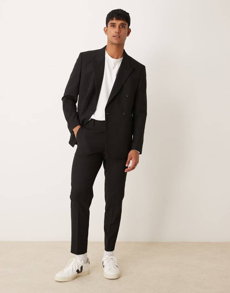 ASOS DESIGN - Schmal zulaufende Anzughose in Schwarz von ASOS DESIGN