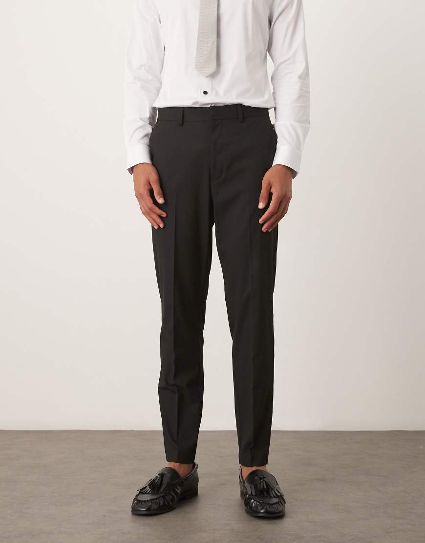 ASOS DESIGN - Schmal zulaufende Anzughose in Schwarz von ASOS DESIGN