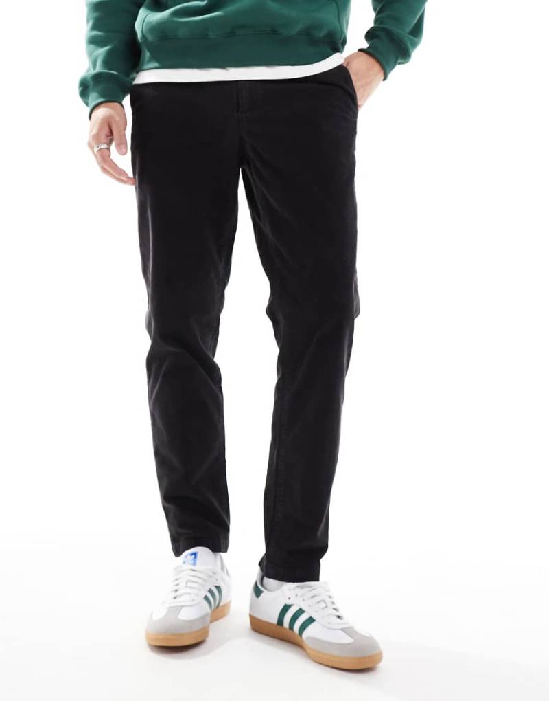 ASOS DESIGN - Schmal zulaufende Cordhose-Schwarz von ASOS DESIGN