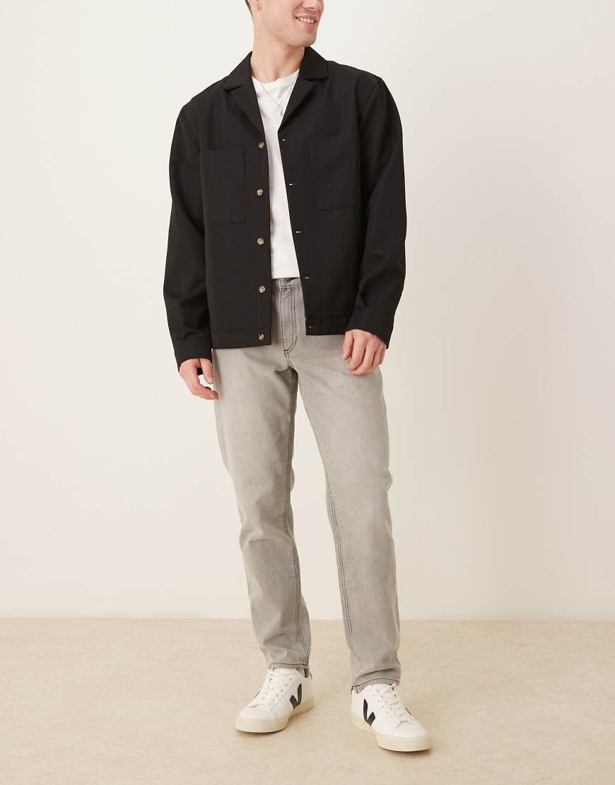 ASOS DESIGN - Schmal zulaufende Jeans in verwaschenem Grau ASOS DESIGN - Schmal zulaufende Jeans in verwaschenem Grau von ASOS DESIGN