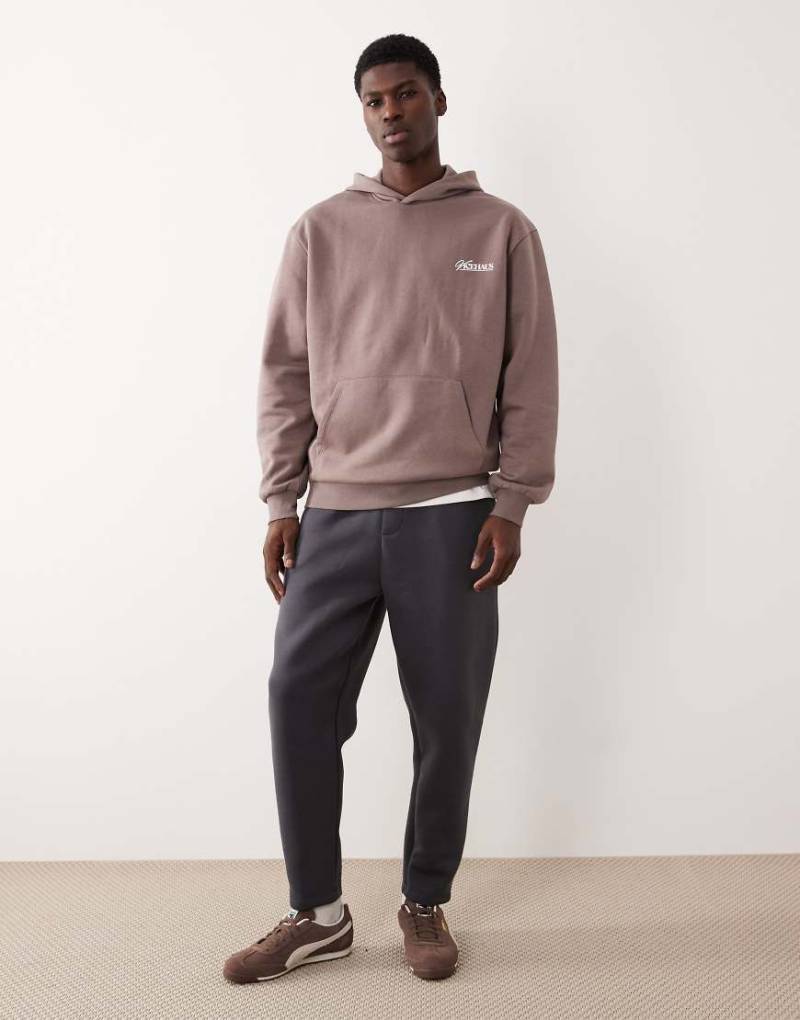 ASOS DESIGN - Schmal zulaufende Jogginghose in Anthrazit aus schwerem Stoff in Neoprenoptik-Grau von ASOS DESIGN