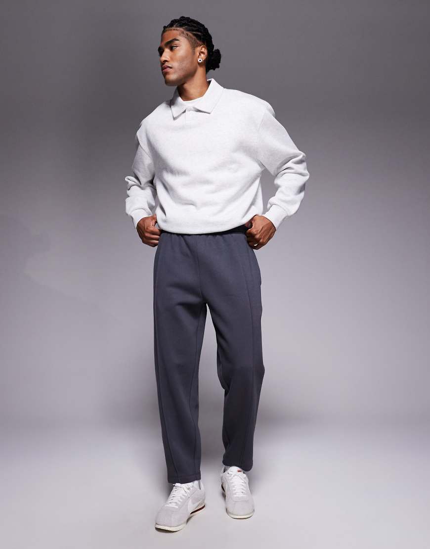 ASOS DESIGN - Schmal zulaufende Jogginghose in Anthrazit mit Biesen-Grau von ASOS DESIGN