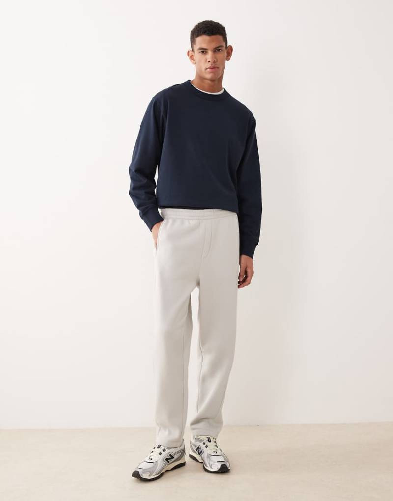 ASOS DESIGN - Schmal zulaufende Jogginghose in Grau von ASOS DESIGN