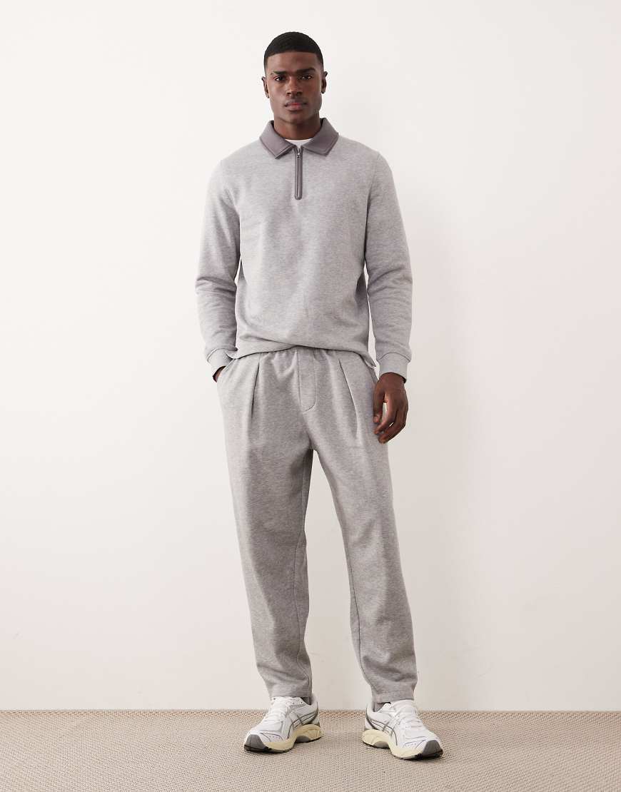 ASOS DESIGN - Schmal zulaufende Jogginghose in Hellgrau von ASOS DESIGN