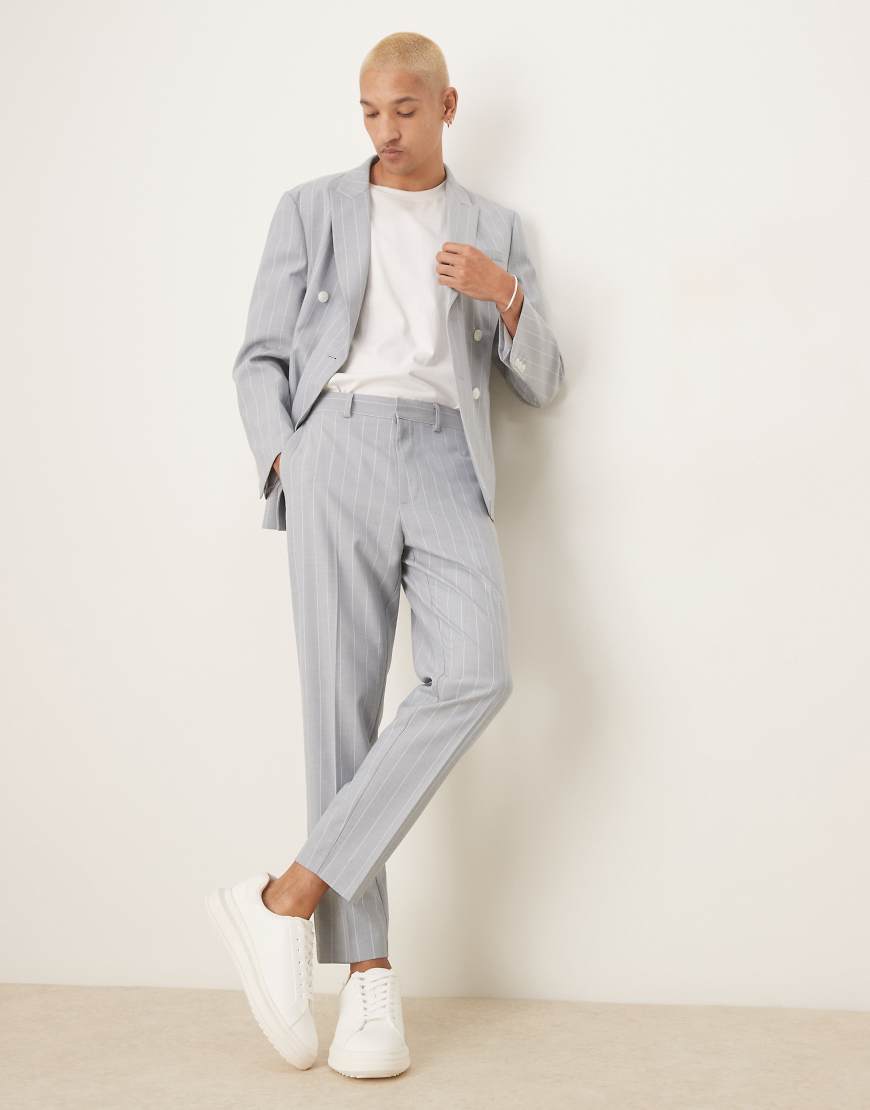 ASOS DESIGN - Schmal zulaufende Nadelstreifen-Anzughose in Blau mit Leinenanteil ASOS DESIGN - Schmal zulaufende Nadelstreifen-Anzughose in Blau mit Leinenanteil von ASOS DESIGN