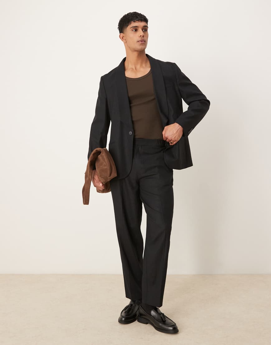 ASOS DESIGN - Schmal zulaufende Oversize-Anzughose aus Leinenmix in Schwarz von ASOS DESIGN