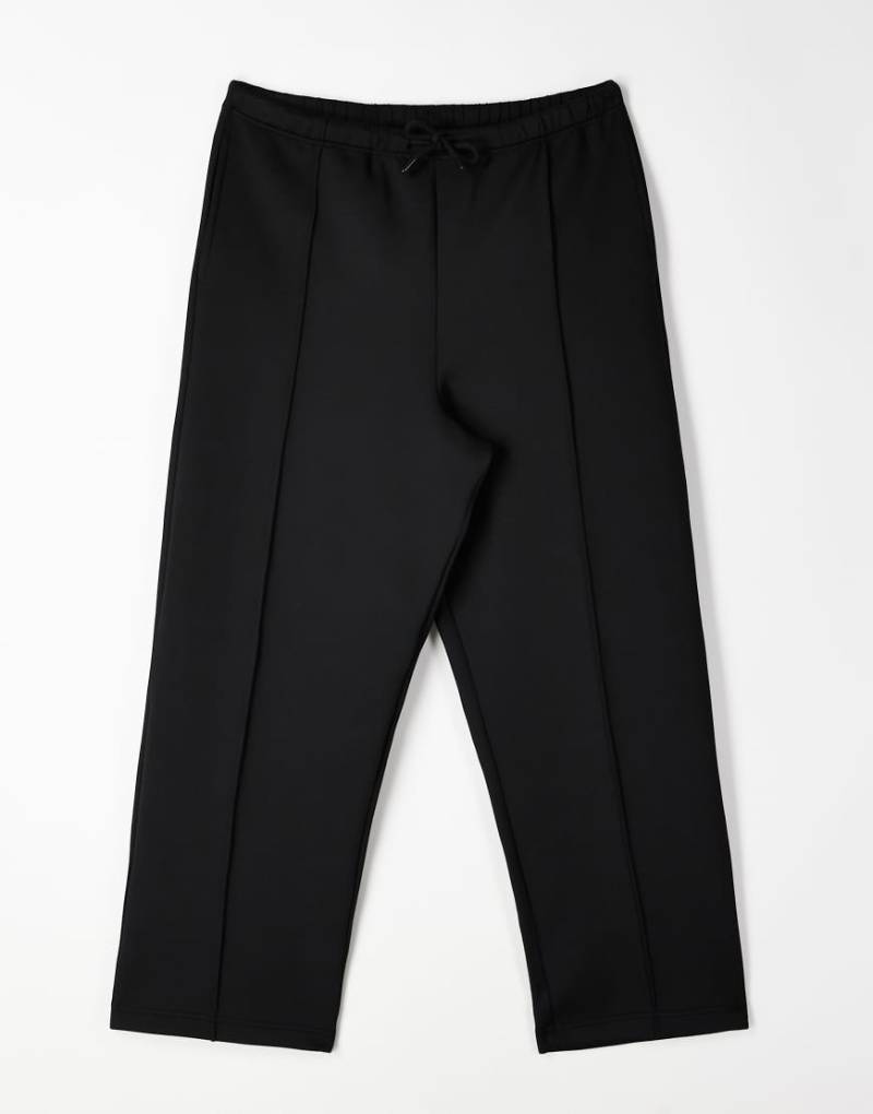 ASOS DESIGN - Schmal zulaufende Relaxed-Fit-Jogginghose in Schwarz mit Biesen, Kombiteil von ASOS DESIGN