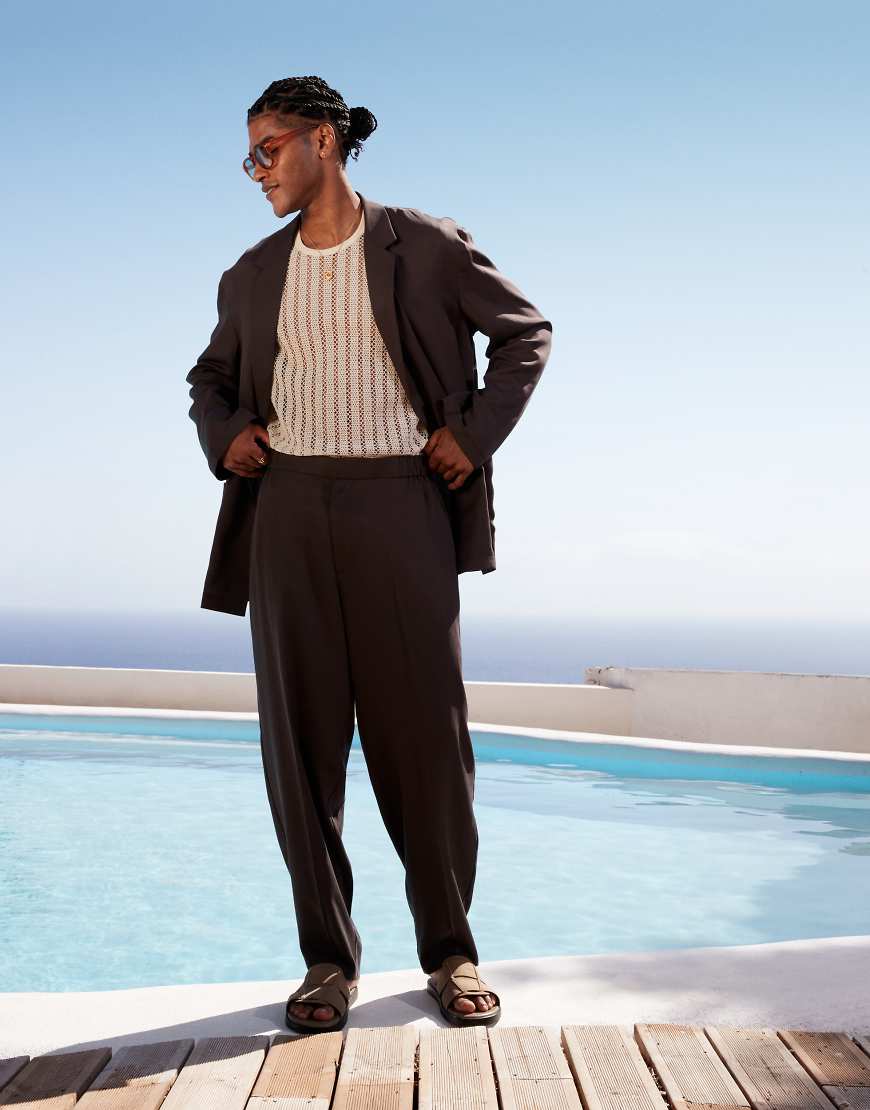 ASOS DESIGN - Schmal zulaufende Strand-Anzughose in Grau mit Oversize-Schnitt von ASOS DESIGN