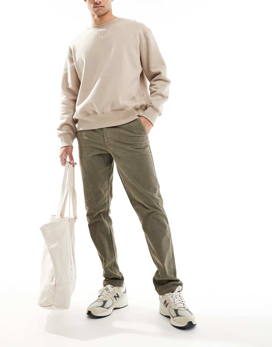 ASOS DESIGN - Schmale Chinohose aus Cord in verwaschenem Khaki-Grün ASOS DESIGN - Schmale Chinohose aus Cord in verwaschenem Khaki-Grün von ASOS DESIGN