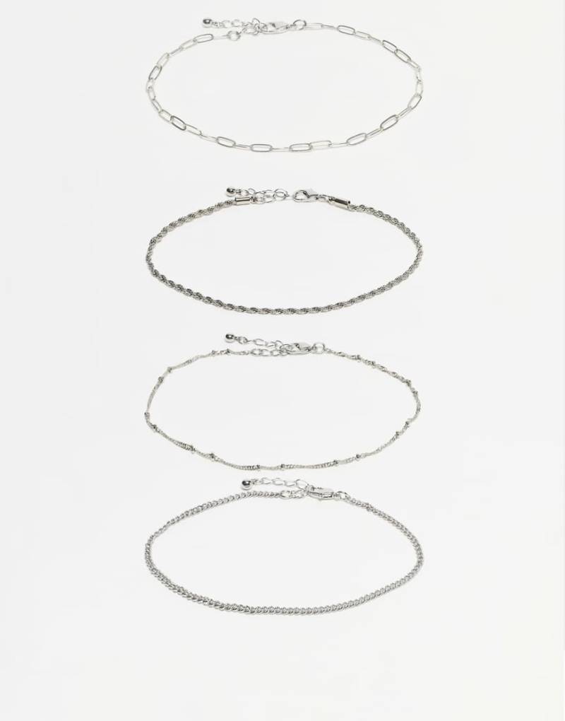 ASOS DESIGN - Schmale Fußkettchen in Silber-Optik im 4er-Pack von ASOS DESIGN