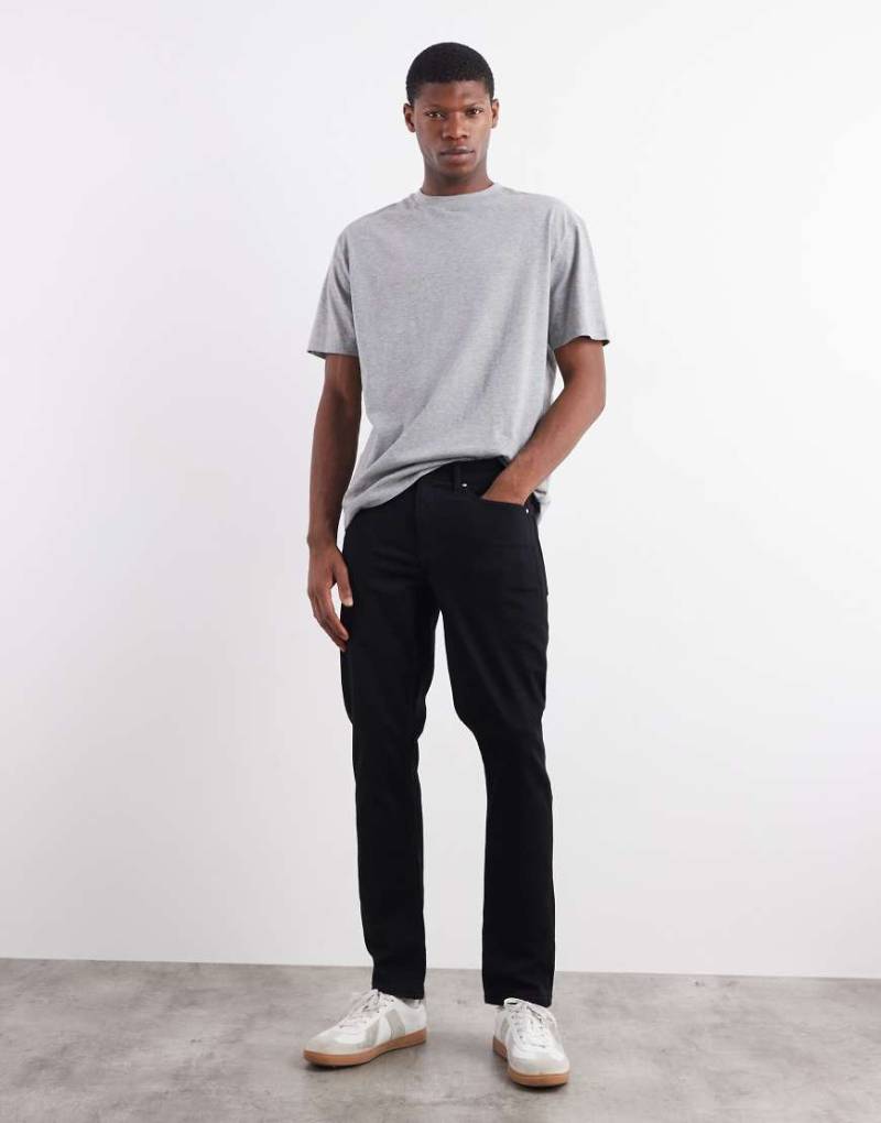 ASOS DESIGN - Schmale Stretch-Jeans in Schwarz von ASOS DESIGN