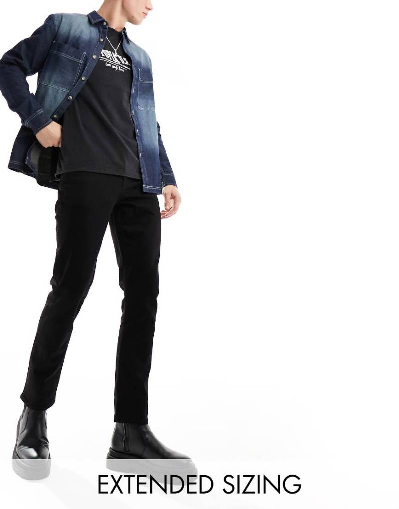 ASOS DESIGN - Schmale Stretch-Jeans in Schwarz von ASOS DESIGN