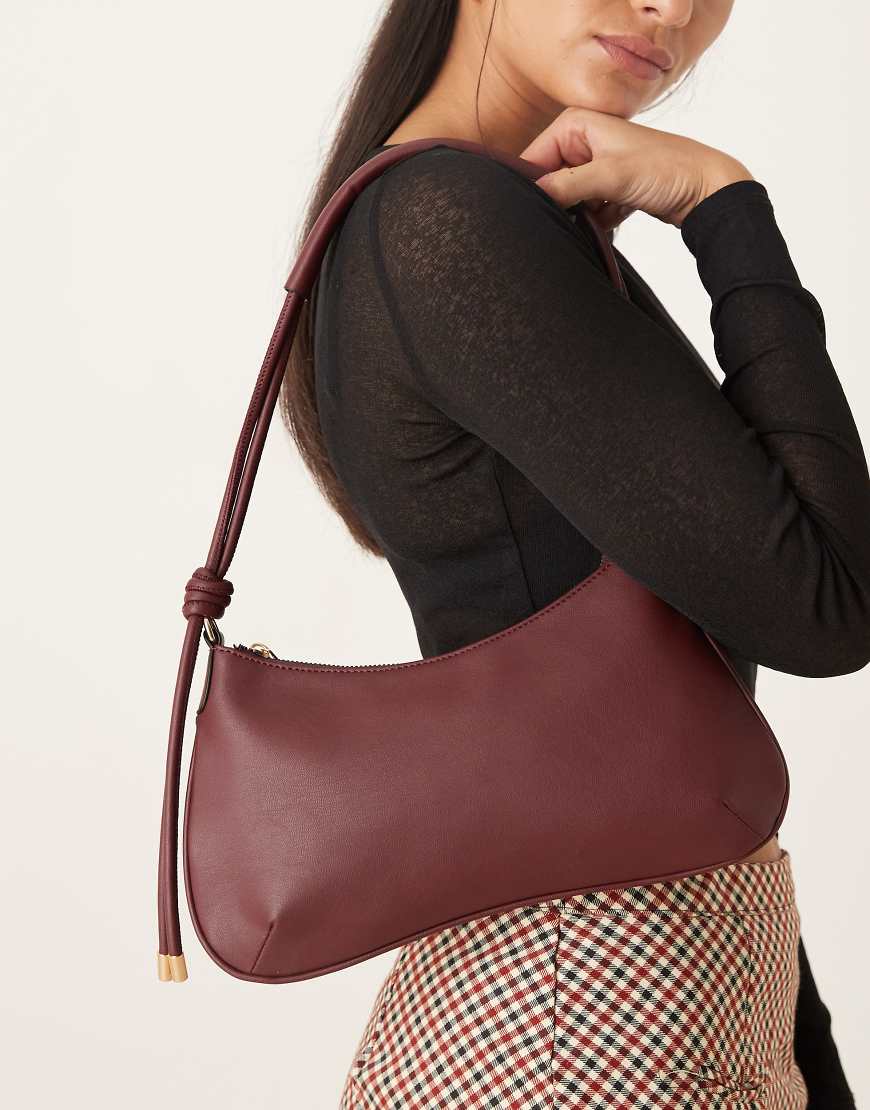 ASOS DESIGN - Schultertasche in Burgunderrot mit dünnem Henkel und Knotendetail von ASOS DESIGN