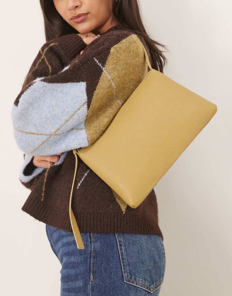 ASOS DESIGN - Schultertasche in Chartreuse mit seitlichen Schnallen am Riemen-Gelb von ASOS DESIGN