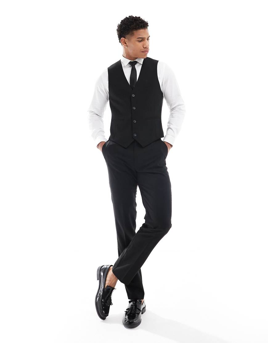 ASOS DESIGN - Schwarze schmal geschnittene Anzughose ASOS DESIGN - Schwarze schmal geschnittene Anzughose von ASOS DESIGN