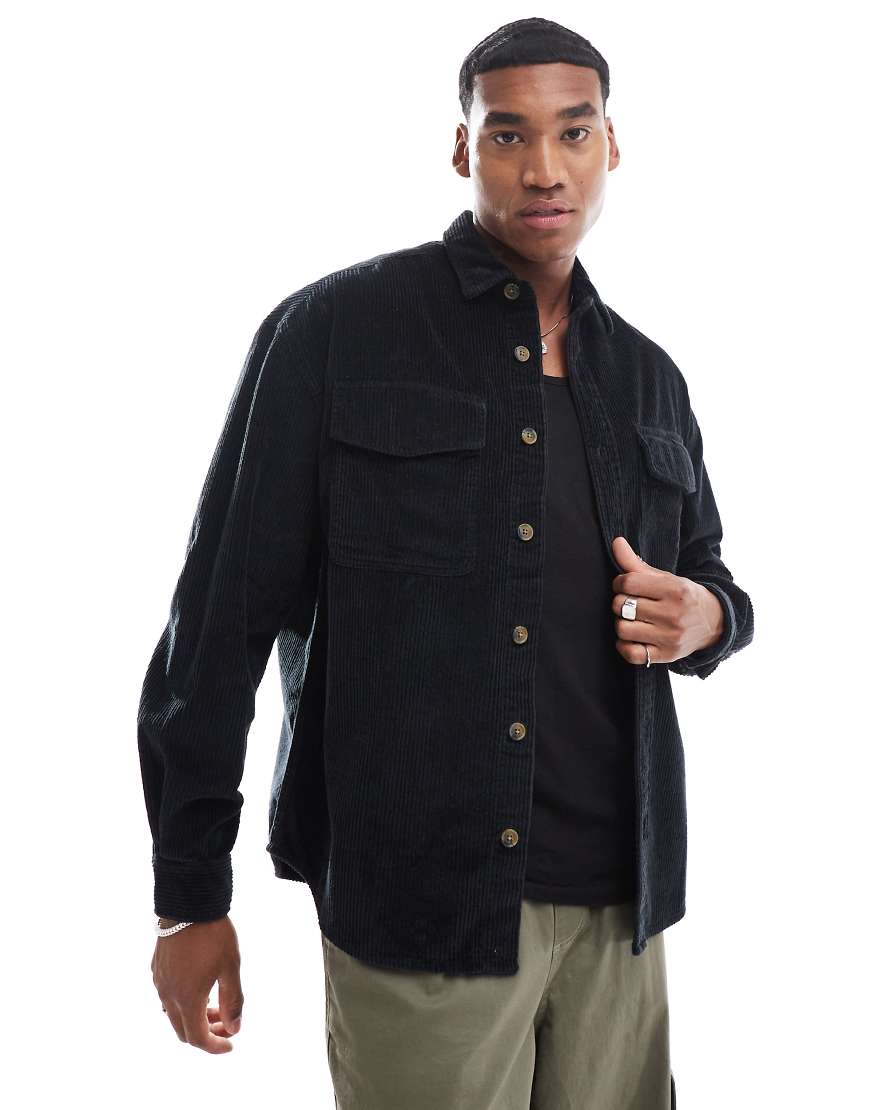 ASOS DESIGN - Schwarzes Oversize-Hemd aus Cord im 90er-Jahre-Stil mit aufgesetzter Tasche von ASOS DESIGN
