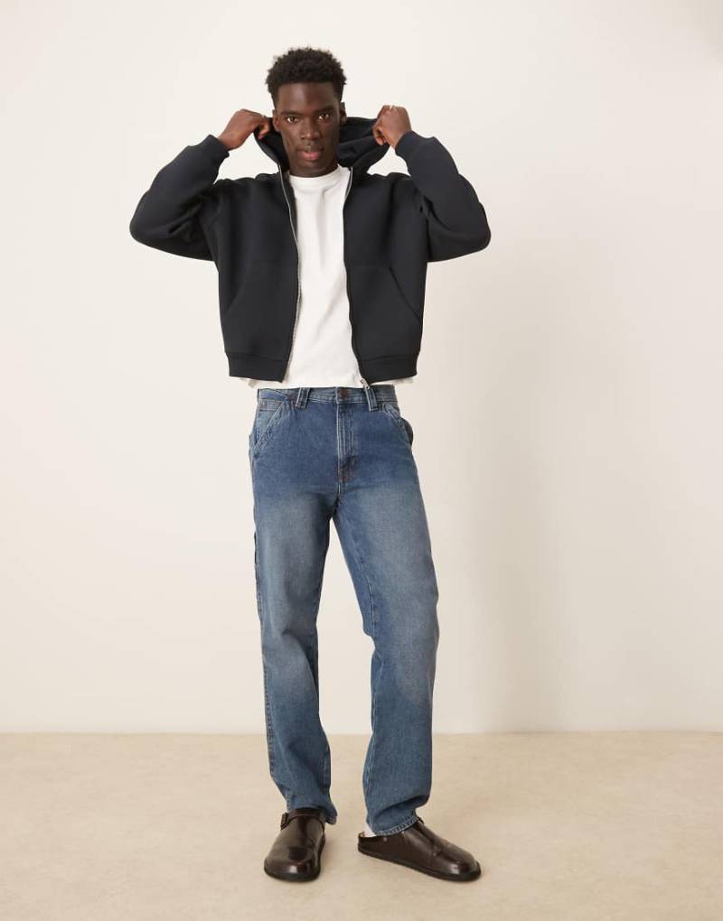 ASOS DESIGN - Schwerer, kastiger Kapuzenpullover aus Neopren-Material in Marineblau von ASOS DESIGN