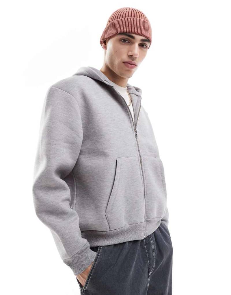 ASOS DESIGN - Schwerer, kastiger Oversize-Kapuzenpullover aus Neopren-Material in meliertem Grau von ASOS DESIGN