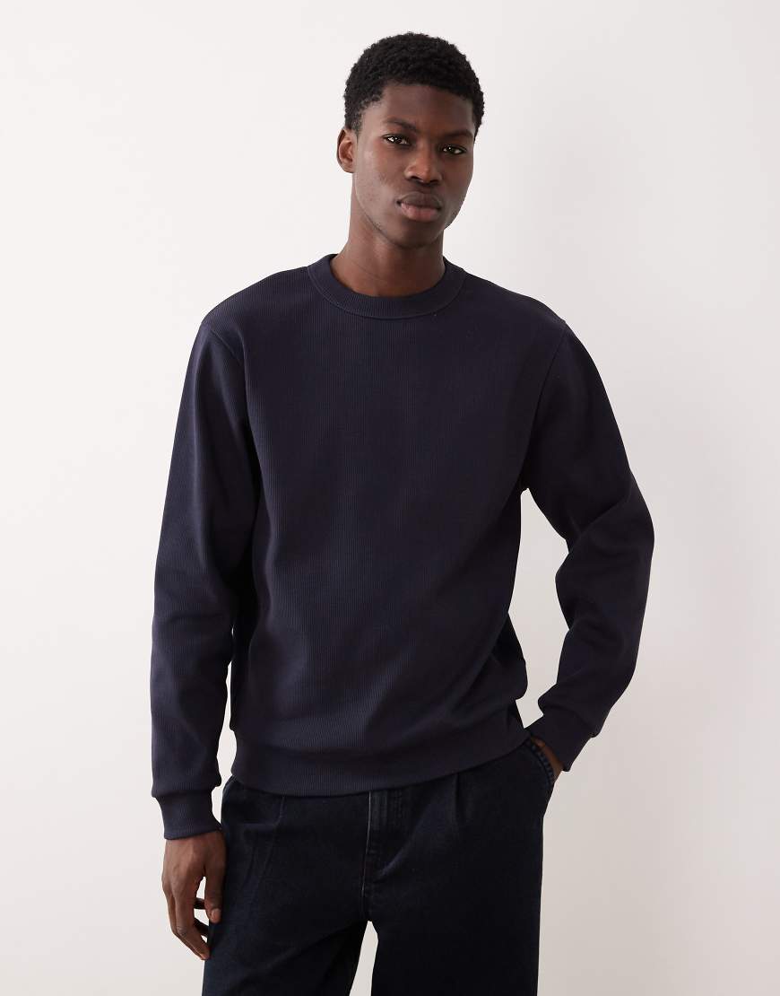 ASOS DESIGN - Schweres, geripptes Sweatshirt in Marineblau ASOS DESIGN - Schweres, geripptes Sweatshirt in Marineblau von ASOS DESIGN