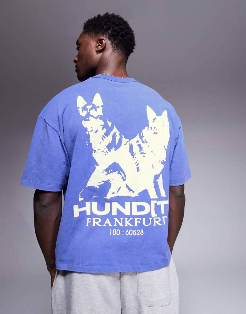 ASOS DESIGN - Schweres, kastiges Oversize-T-Shirt in verwaschenem Blau mit Grafikprint von ASOS DESIGN