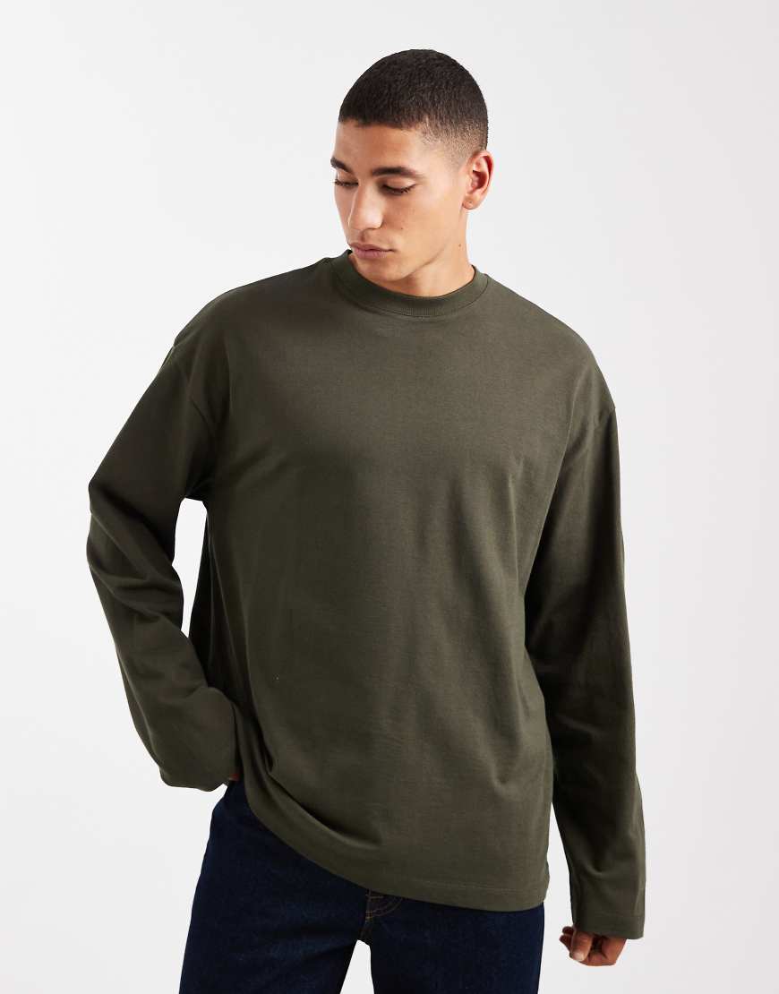 ASOS DESIGN - Schweres, langärmliges Oversize-T-Shirt in Dunkelgrün von ASOS DESIGN