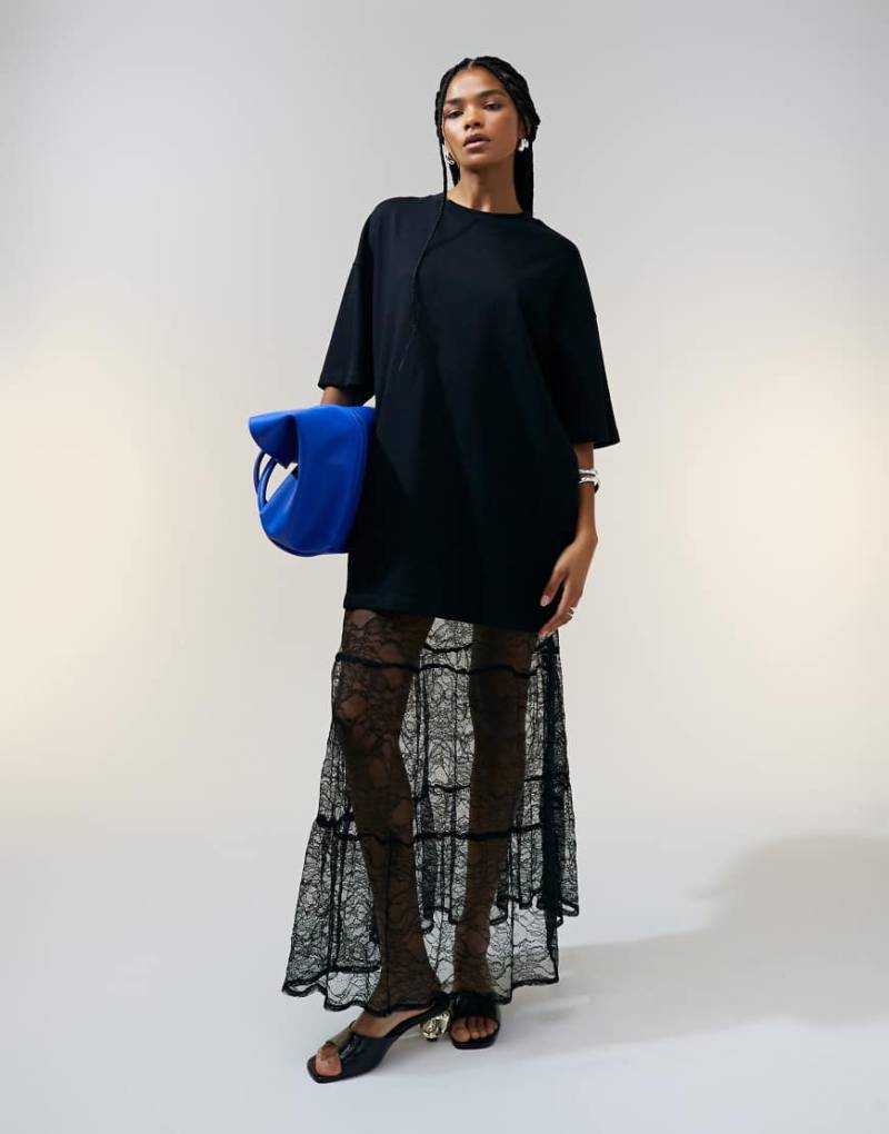 ASOS DESIGN - Schweres Oversize-T-Shirt in Schwarz mit langem Schnitt von ASOS DESIGN