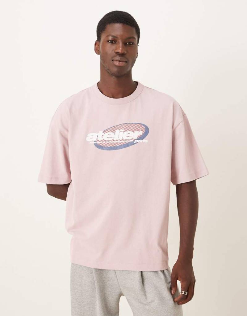 ASOS DESIGN - Schweres Oversize-T-Shirt in verwaschenem Rosa mit City-Grafikprint von ASOS DESIGN