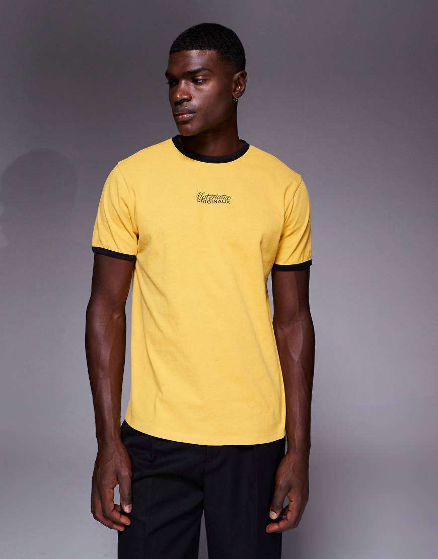 ASOS DESIGN - Schweres Ringer-T-Shirt in verwaschenem Gelb mit Text-Grafikprint von ASOS DESIGN