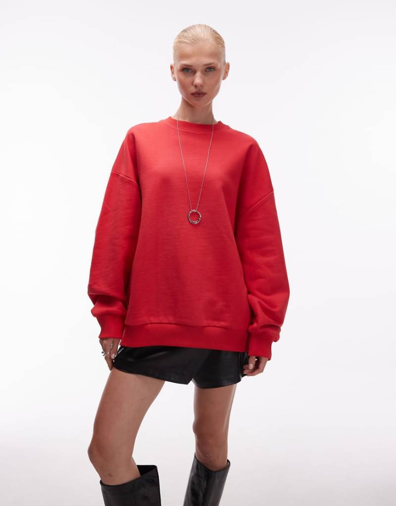 ASOS DESIGN - Schweres Sweatshirt in Rot mit Ballonärmeln von ASOS DESIGN