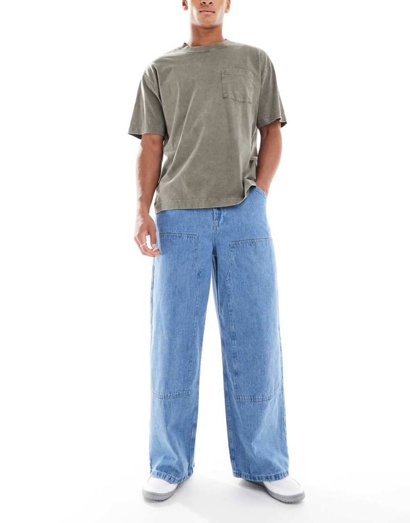 ASOS DESIGN - Sehr weit geschnittene Carpenter-Jeans in Indigo-Waschung-Blau von ASOS DESIGN