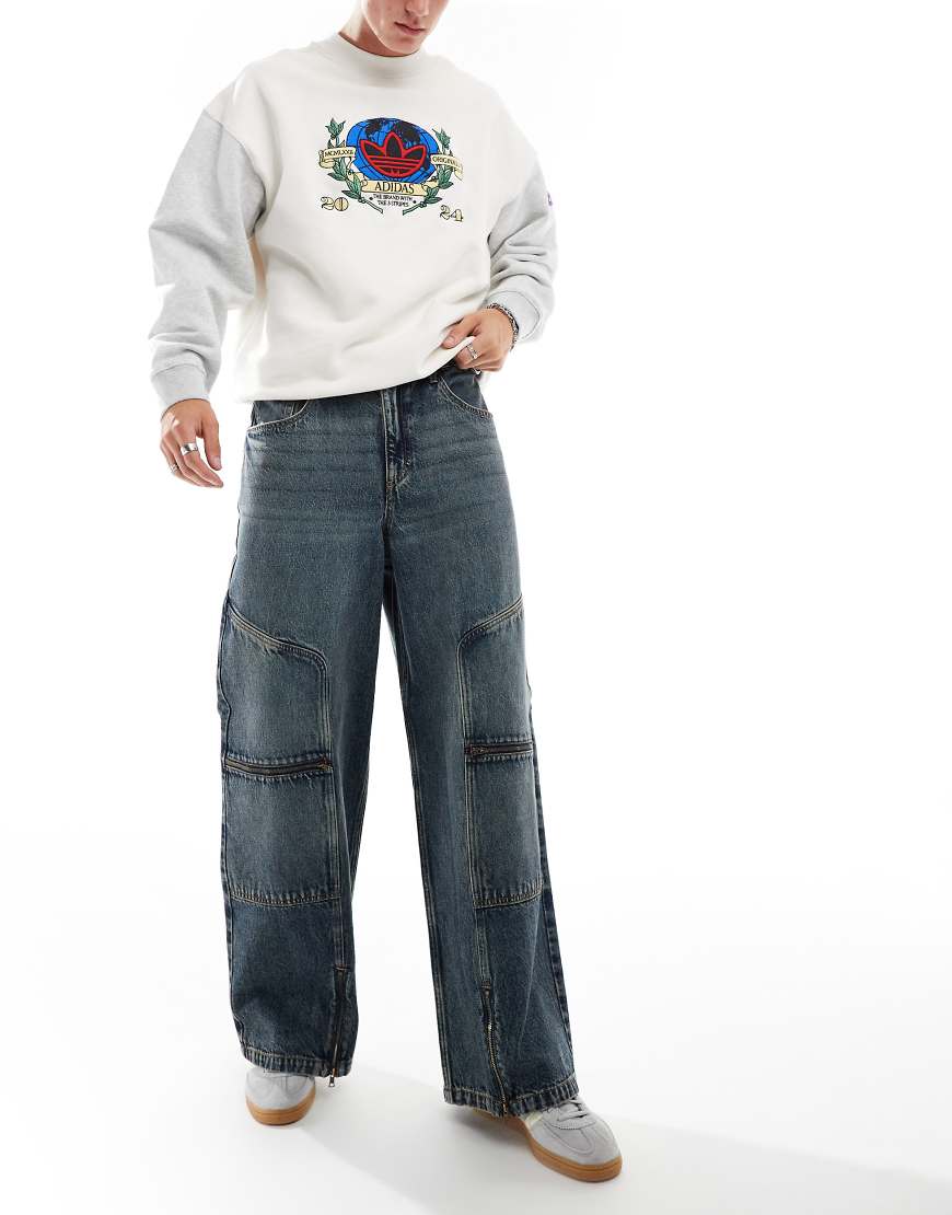 ASOS DESIGN - Sehr weite Jeans in mittlerer Waschung mit Einsätzen und Reißverschlussdetails-Blau ASOS DESIGN - Sehr weite Jeans in mittlerer Waschung mit Einsätzen und Reißverschlussdetails-Blau von ASOS DESIGN