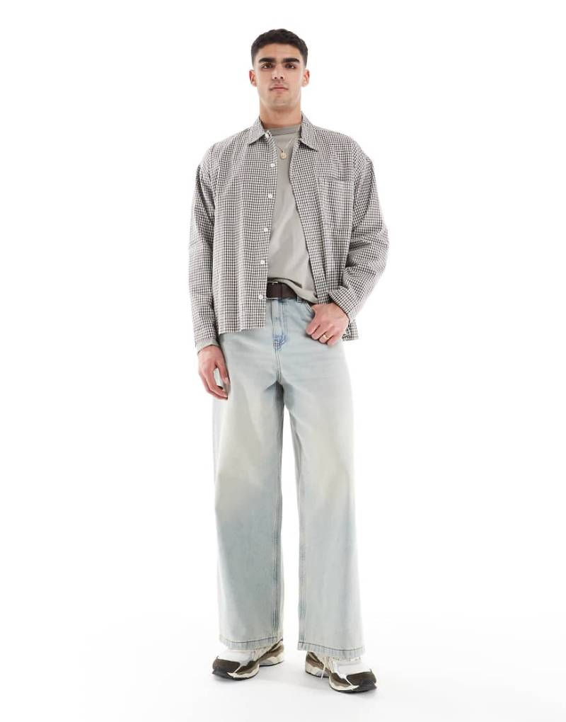 ASOS DESIGN - Sehr weite Jeans in verwaschenem Hellblau mit Vintage-Tönung von ASOS DESIGN