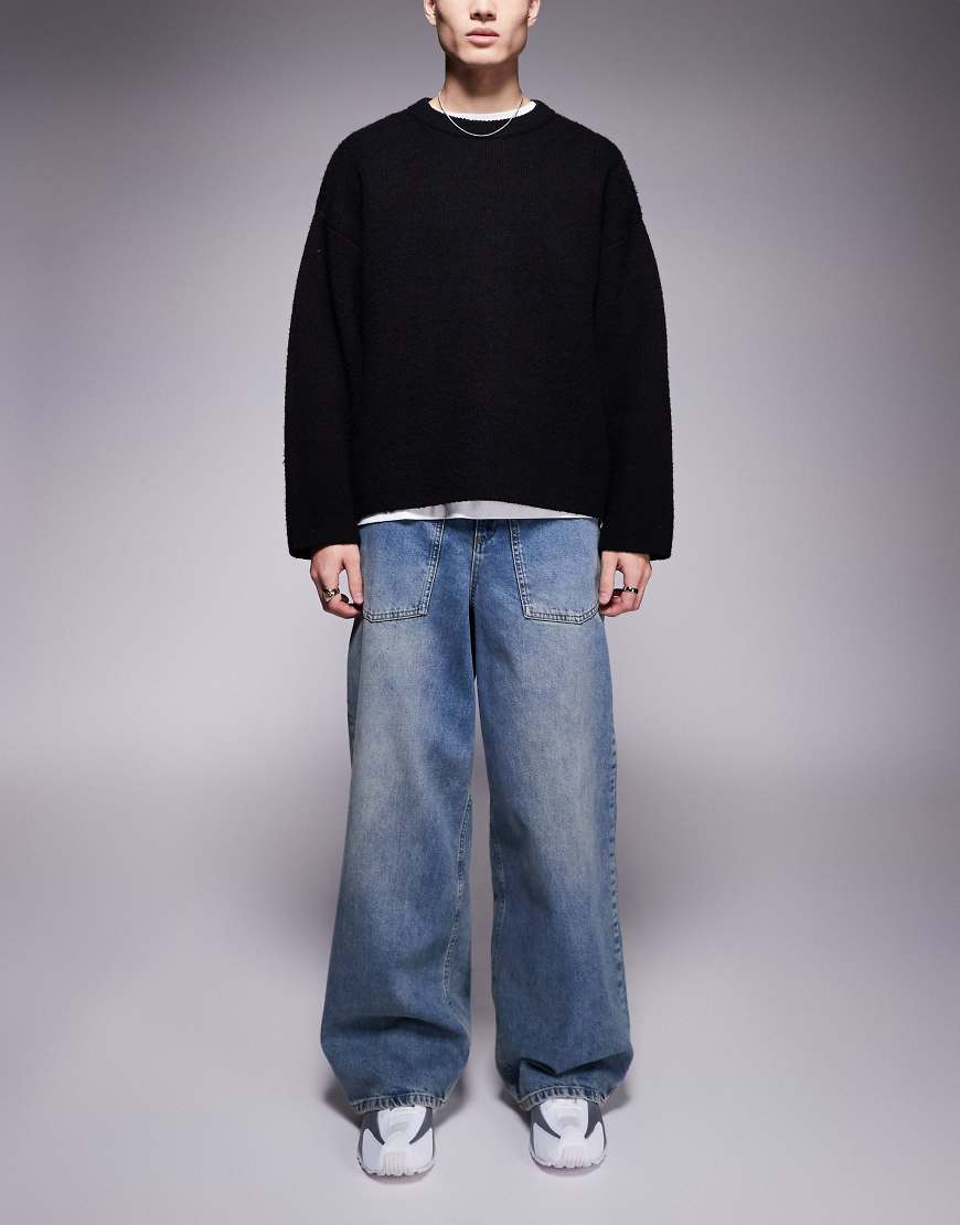 ASOS DESIGN - Sehr weite Jeans mit Waschung in Hellblau und umgekehrtem Design ASOS DESIGN - Sehr weite Jeans mit Waschung in Hellblau und umgekehrtem Design von ASOS DESIGN