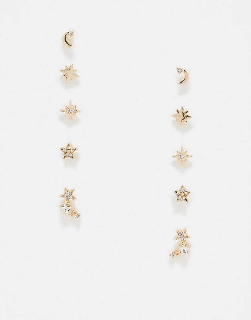 ASOS DESIGN - Set aus 5 goldfarbenen Ohrsteckern mit Himmelskörper-Design von ASOS DESIGN