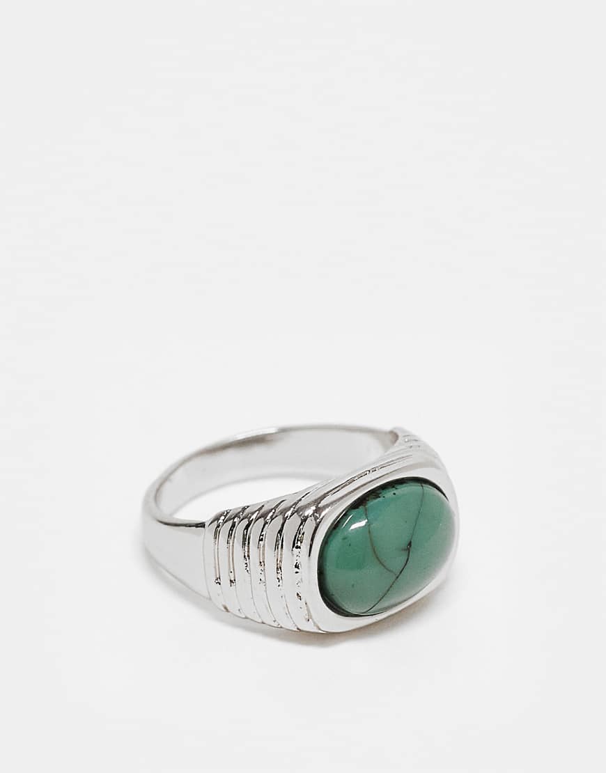 ASOS DESIGN - Silberfarbener Siegelring mit blauem Schmuckstein ASOS DESIGN - Silberfarbener Siegelring mit blauem Schmuckstein von ASOS DESIGN