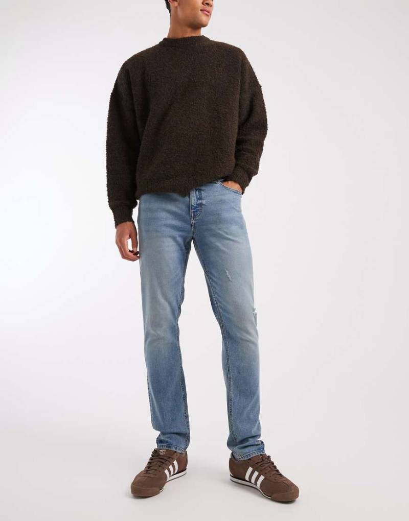 ASOS DESIGN - Skinny-Fit-Jeans in mittelblauer Vintage-Waschung von ASOS DESIGN