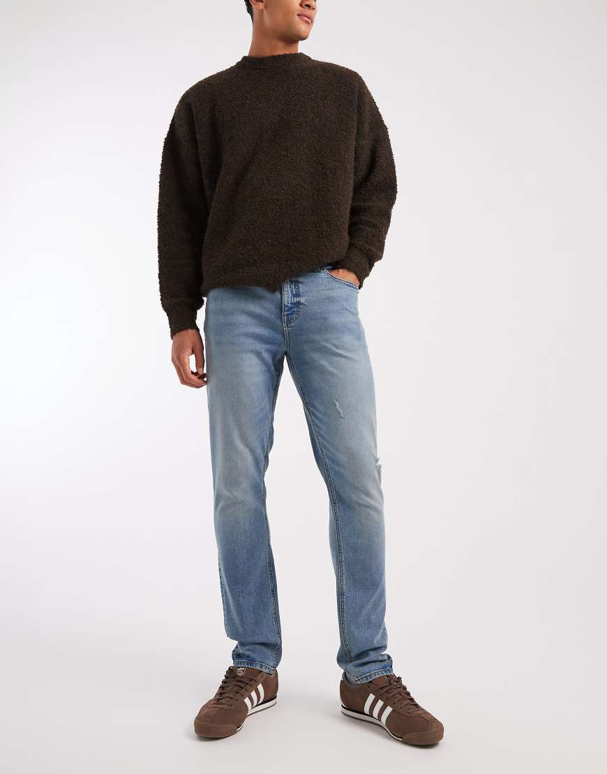 ASOS DESIGN - Skinny-Fit-Jeans in mittelblauer Vintage-Waschung von ASOS DESIGN