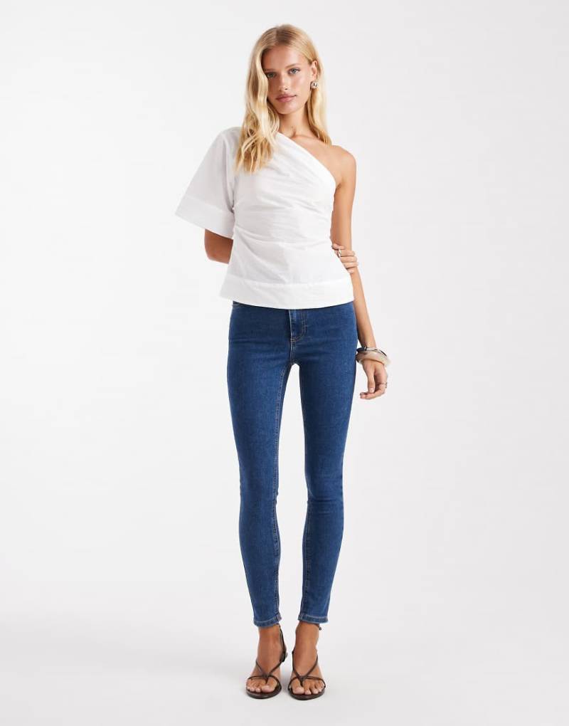 ASOS DESIGN - Skinny-Jeans in Mittelblau von ASOS DESIGN