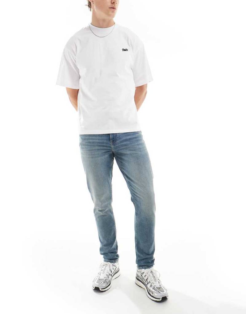 ASOS DESIGN - Skinny-Jeans in verwaschenem Hellblau von ASOS DESIGN