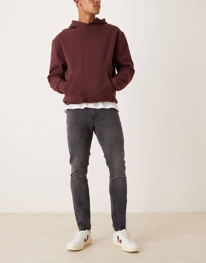 ASOS DESIGN - Skinny-Jeans in verwaschenem Schwarz von ASOS DESIGN